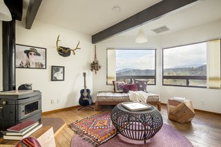 A Modified A-Frame Overlooking Los Angeles Starts at $699K - Photo 9 of 9 - Complete with a Franklin stove, one of the bedrooms can be easily converted into an office or study.