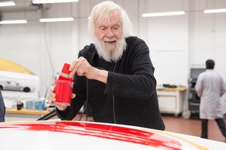 John Baldessari Blazes a Trail at the Daytona International Speedway With BMW Art Car #19 - Photo 4 of 11 - Baldessari paints an oversized red dot on the roof, staying true to his artistic trademark and boosting the car's visibility during the race. 