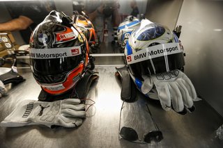 John Baldessari Blazes a Trail at the Daytona International Speedway With BMW Art Car #19 - Photo 8 of 11 - In the BMW motorhome, fans are directed at helmets to dry off the sweat.