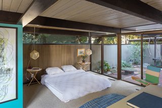 Snag This Midcentury Stunner in Southern California For $799K - Photo 9 of 10 - The master bedroom has the benefit of a private courtyard.