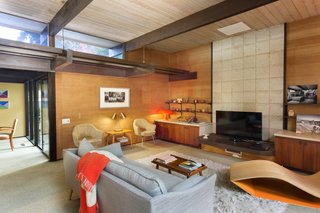 Snag This Midcentury Stunner in Southern California For $799K - Photo 4 of 10 - Clerestory windows allow more light to stream into the den.