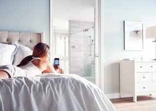 Create Your Personal Oasis With U by Moen Shower - Photo 3 of 5 - You can remotely turn on the shower and set it to automatically pause after heating up, adjust the temperature, or turn the outlets on and off—all from your phone.