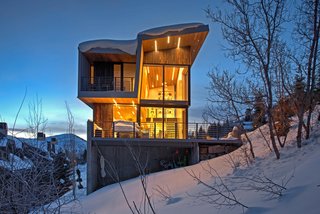 The shou sugi ban exterior siding stands as a bold contrast in the snow, and is "bulletproof in the hot desert summer," says Mullin.