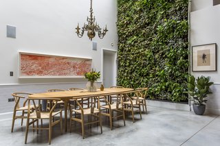 Stay in a Converted Victorian Cooperage in London - Photo 6 of 7 - The living wall designed by Scotscape provides a refreshing backdrop to the dining area.