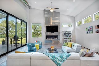 10 Outdoor Living Trends That Bring Homeowners Blissfully Close to Nature - Photo 10 of 10 - Dark bronze anodized frames were chosen for the Milgard aluminum windows and sliding patio doors as a contrast to the limestone exteriors.