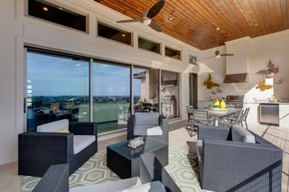 10 Outdoor Living Trends That Bring Homeowners Blissfully Close to Nature - Photo 4 of 10 - Milgard Moving Glass Walls leverage views of the surrounding area.