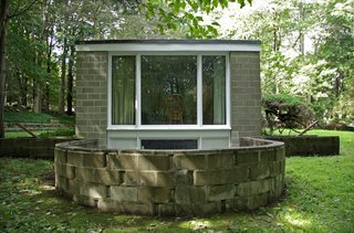 With $1 Million, You Can Save Philip Johnson’s First Commissioned House - Photo 6 of 9 - A large window from the bedroom overlooks the sunken terrace that allows the basement-level studio to open to the outside.