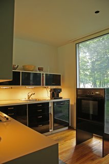 With $1 Million, You Can Save Philip Johnson’s First Commissioned House - Photo 5 of 9 - The original kitchen was designed by the Booths, and Robert renovated it in 2000, making it ergonomic for his wife Sirkka's shorter frame.