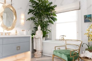 In "Master Bath: Restore and Refresh," designer Cecilie Starin encourages contemplation with plants, Asian accents, natural objects, and art. The gold, faceted vanity mirrors slide apart to allow views of the bay.