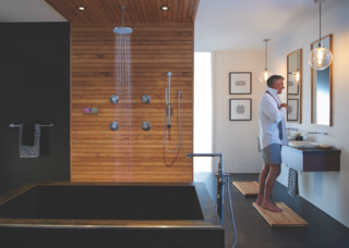 Both practical and economical, the U by Moen shower runs the water until it hits your preset temperature, pausing it until you're ready to step in.