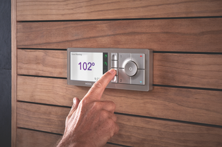 Large, intuitive-to-use buttons save your presets on the U by Moen controller, which is designed to blend into a variety of bathroom styles.