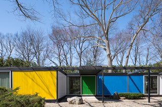 A Rare Midcentury Prefab Looks Just Like it Did in 1958—Down to the Knoll and Paul McCobb Interiors - Photo 1 of 13 - Built with a steel frame, the Frost House features panels of styrofoam between aluminum sheets for the exterior walls and styrofoam between plywood for the roof and floors. Bold, primary colors accentuate its geometric form.