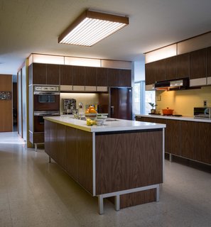 A Rare Midcentury Prefab Looks Just Like it Did in 1958—Down to the Knoll and Paul McCobb Interiors - Photo 5 of 13 - Paul McCobb designed the kitchen, built-in shelving units, and vanities throughout the abode. All the original General Electric appliances are in working order.