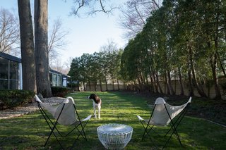 A Rare Midcentury Prefab Looks Just Like it Did in 1958—Down to the Knoll and Paul McCobb Interiors - Photo 12 of 13 - Because Alside Homes were so long, they required two lots to build on. Dr. Frost purchased a third lot to ensure privacy, providing the current homeowners plenty of room to add a pool. "That's an endeavor to be respectiful," says Valentine. "We're trying to make it look like it's always been there."