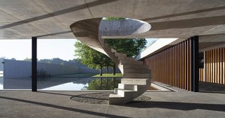 Celebrated Polo Player Nacho Figueras Commissions a Low-Slung, Concrete Stable - Photo 2 of 11 -