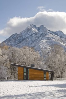 10 Modern Wintry Cabins We’d Be Happy to Hole Up In - Photo 9 of 10 - Pasture Project is built on a pasture in the shadows of Mt. Olympus in Holladay, Utah by Imbue Design. With a focus on using minimal energy, the home’s living space is situated with a north/south orientation to aid in winter heat gain and summer protection.