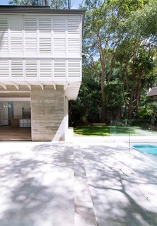 5 Sustainable Ways To Beat the Heat Without Air Conditioning - Photo 1 of 11 - The shading for the upper bedroom floor of this home by Luigi Rosselli Architects is open to an infinite combination of shutter operations. Folding, retractable, tiling blades can be adjusted with the seasons, while the windows below are shaded in the hottest hours by the loggia.