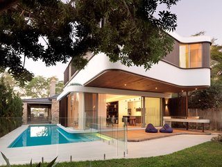 Take a Plunge Into These Enticing Modern Pools - Photo 7 of 12 - The master bedroom back elevation is intended to direct the windows away from the side neighbors.