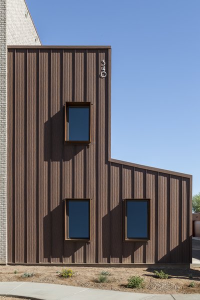 Custom Cor-Ten steel window boxes add shade to south facing windows #modern #window #shade #windowbox Photo 12 of Uptown Row modern home