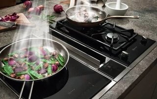 Kitchen News and Trends from Cologne - LivingKitchen 2017 - Photo 4 of 7 - Home appliance manufacturer NEFF is launching a new range of FlexInduction hobs with integrated ventilation, specially designed for those of us who like to have a clear view and lots of head space in the kitchen.<br><br>The new cooktop ventilation combines the functions of the FlexInduction hob with the efficiency of the venting hood in one single appliance thus giving you more flexibility, headspace and a free view of the kitchen.