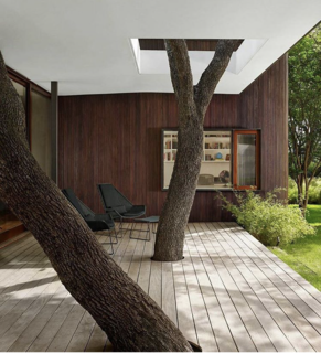 Mark Word Design incorporates trees directly into the deck and seating area at the Lakeview Residence in Austin, Texas.