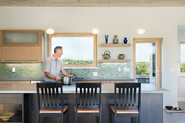 Zola Tilt & Turn - Zola Thermo Clad
Zola Tilt & Turn windows use only the finest German multi-point hardware sets available to ensure a smooth and effortless operation. These windows can both swing in and tilt in with a simple turn of the ergonomic handle. European designs often use Tilt & Turn windows for additional ventilation or access.
Tilt & Turn windows can be very large, with each sash up to five and a half feet wide. Zola Tilt & Turn windows have a multi-point locking mechanism providing safety and superb air sealing. Photo 2 of Sunset modern home