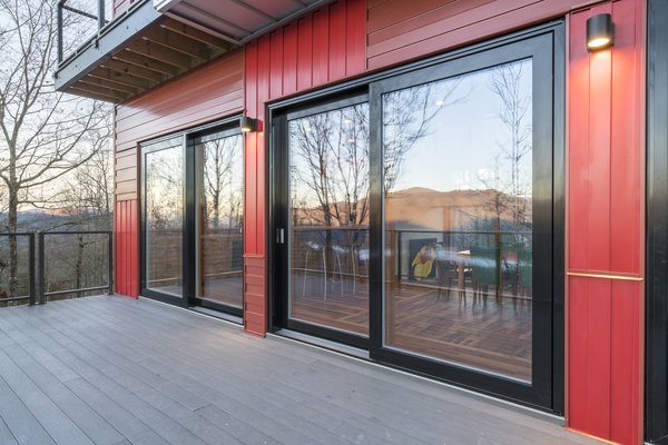 Lift & Slide Door - Zola Thermo Clad
Zola Lift & Slide Door is an innovative solution for maximizing views using wide uninterrupted expanses of glass. These doors offer exceptionally high energy performance and superior operability. Available in the PanoramicView, Thermo Alu lines, Thermo Plus Clad, Thermo Clad, Thermo Wood and Thermo uPVC product lines. Photo 4 of Love Shack modern home
