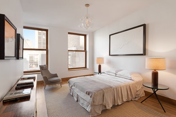 Zola Windows played a crucial role in helping to embrace and engender the “Passive House” construction standard, allowing a landmark protected large commercial building to be transformed into an architecturally precise, low energy, high performance masterpiece. For 60 White Street, a brand new class of window was developed that pushes the technological envelope while faithfully replicating the look appropriate for a 146 year-old historic edifice. Zola’s American Heritage SDH (Simulated Double Hung) window helped create a well-insulated, draft free building envelope akin to a thermos bottle. Photo 14 of An Historic TriBeCa Building Reborn modern home