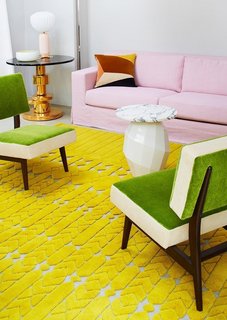 25 Bold Ways to Decorate with Yellow - Photo 6 of 25 - A textural retro rug in chartreuse contrasts off pretty pinks and grassy green shades in this living room vignette. The bold yellow color is ever so slightly sour, just enough to make you pucker up in the best way.<br><br>Photo courtesy of Manufacture Cogolin<br><br>#chartreuse<span> <a href="/discover/colorcrush">#colorcrush</a></span><span> <a href="/discover/color">#color</a></span><span> <a href="/discover/yellow">#yellow</a></span><span> <a href="/discover/design">#design</a></span><span> <a href="/discover/mydomaine">#mydomaine</a></span>