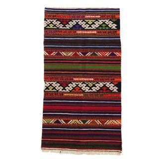 This Insanely Cool Loft Is What Downtown Dreams Are Made Of - Photo 18 of 29 - Chairish "Turkish Hand-Woven Anatolian Rug" ($210)
