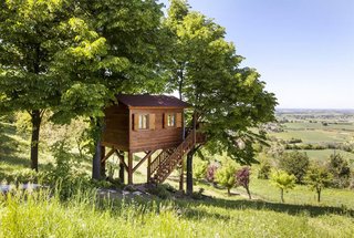 7 Breathtaking Tree Houses You Can Actually Rent on Airbnb - Photo 4 of 7 - A tree house hideout in the northern Italian hillside sounds like the perfect vacation. There's a swimming pool right on the property, so we suggest visiting during the warmer months when you can enjoy the sun. And wine tours through the gorgeous vineyards are always an option in Montferrat, rain or shine (but you should double-check before booking any tours).