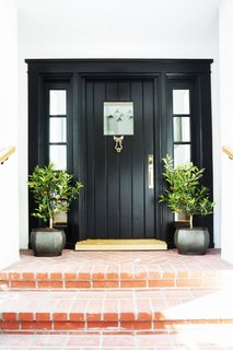 What's the Best Color to Paint Your Front Door? Your Guide to Finding The One - Photo 17 of 22 - This is a door we adore. There's something so stylishly simple about a classic black door and frame that reminds us it's time to step up.