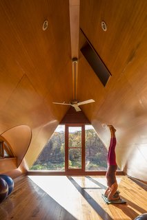 A Restorative Getaway from the City - Photo 13 of 13 - Both James and Anne are avid yoga enthusiasts, so the loft area was built with their sessions in mind.