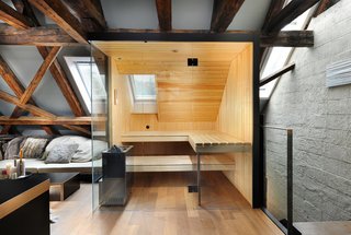 10 Sterling Saunas in Modern Homes - Photo 5 of 9 - A rustic interior pairs perfectly with this Küng Sauna's ultra-modern look.