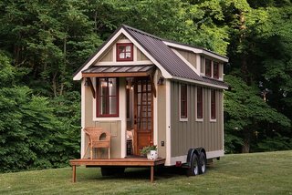 This mobile tiny house by Timbercraft Tiny Homes is 150 square feet of southern charm.