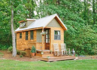Chattanooga's Wind River Bungalow was the first tiny house built by Travis Pyke of Wind River. Cedar sidings are met with interior oak surfaces and storage.