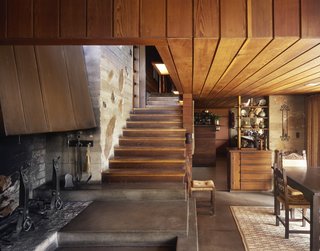 An Architect in Her Own Wright - Photo 2 of 4 - The Wood-Peterson house in Colorado Springs was built in 1950 by Ingraham and Ingraham, Architects, who used flat fieldstone set in poured concrete through much of the home. You'll notice they kept the stairwell clean by eliminating a railing and included built-in cabinets that appear in many of their homes.