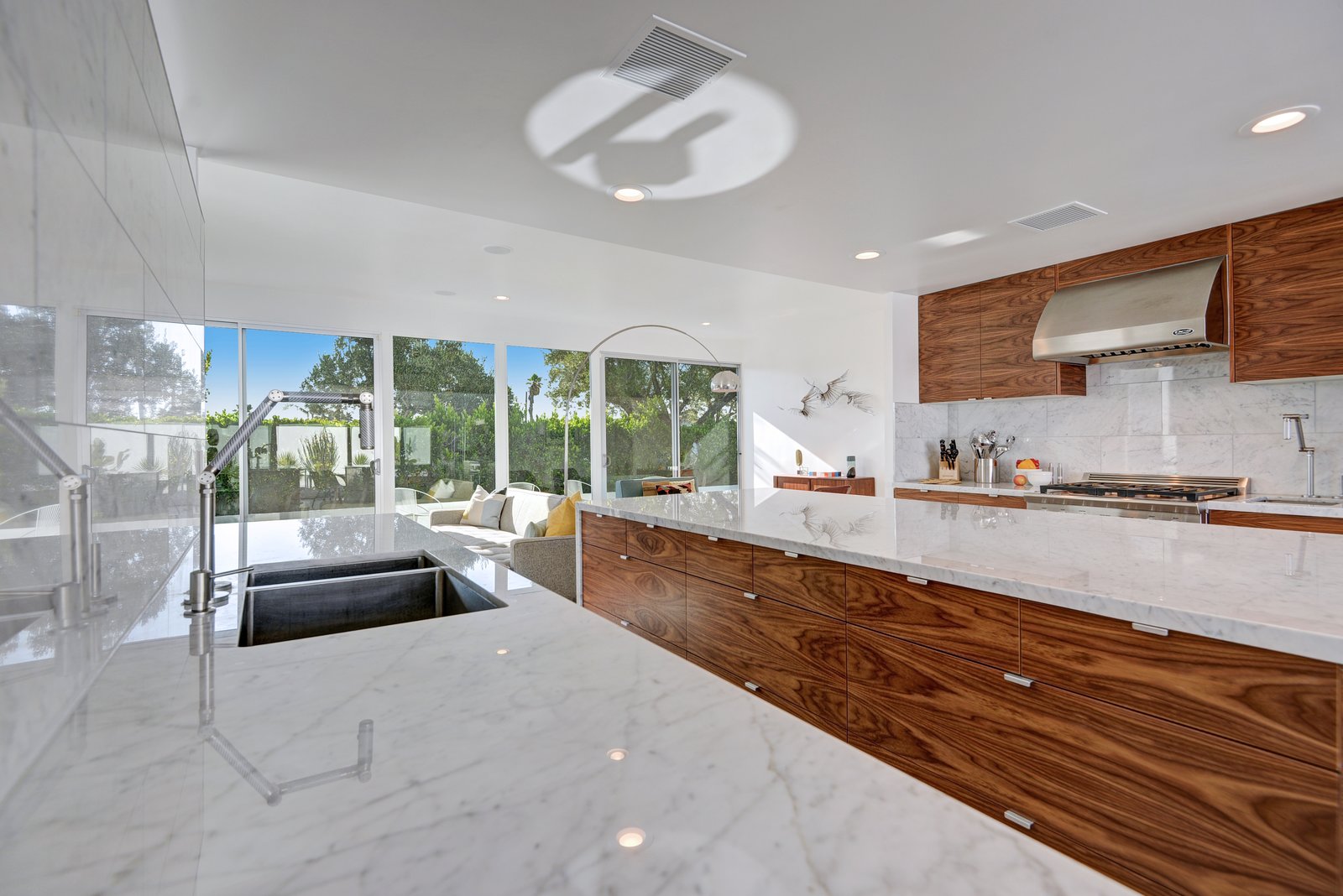 To keep the home as open as possible, elements like refrigerator drawers were selected in lieu of traditional appliances.