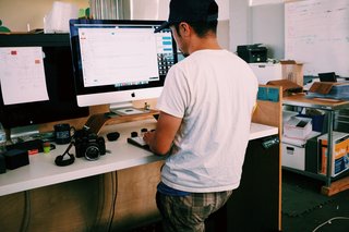 Craft & Vigor:
Inside Design at Grovemade - Photo 2 of 9 - Grovemade founder Ken Tomita, hard at work from his standing desk.