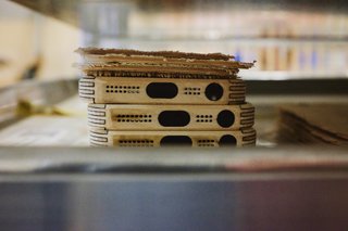 Craft & Vigor:
Inside Design at Grovemade - Photo 5 of 9 - Wood iPhone cases waiting to be finished.