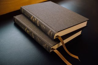 Sacred Space: an Exploration in Modern Bible Design - Photo 4 of 6 - Two New Testament volumes of the new Reader's Bible in rich olive cloth-over-board bindings.