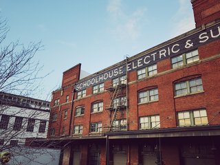 A Schoolhouse Electric Christmas - Photo 1 of 8 - An exterior view of Schoolhouse's factory and warehouse showroom space.