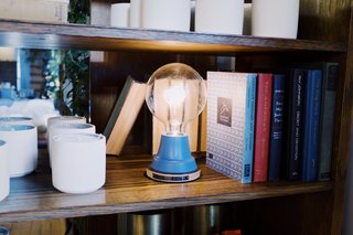 A Schoolhouse Electric Christmas - Photo 6 of 8 - This light features a beautifully hued blue matte paint with a Russian birch plywood base attached to each handspun steel fixture.