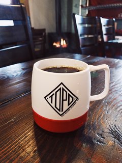 VSCO RAW/X and Topo Designs - Photo 5 of 9 - The hot steam and warm fire make a nice backdrop to this scene. VSCO RAW captures light beautifully with a range of expression. Notice the steam billowing out of the insulated mug.