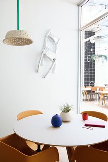 Seas of neutrals are juxtaposed with pops of vibrant colors and life.