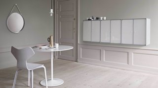 Denmark's Montana Takes a Modern Approach to Household Storage - Photo 4 of 5 - This wall unit mounted in a dining room makes for a subtle way to store dishes and tableware.