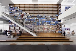 10 Ways to Use Color to Transform a Room - Photo 9 of 10 - This wall of carefully arranged books at Warby Parker's NYC offices emphasizes their primary brand color in a unique way.