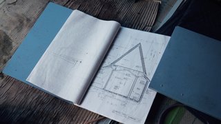 The Community-Run Cedar House by Airbnb and Go Hasegawa Welcomes Guests in Rural Japan - Photo 1 of 12 - Bound books reveal detailed plans for bringing the Yoshino Cedar House to life.