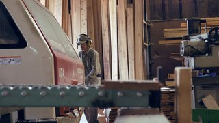 The Community-Run Cedar House by Airbnb and Go Hasegawa Welcomes Guests in Rural Japan - Photo 4 of 12 - Workers prepare cedar planks for use in Yoshino Cedar House.