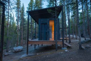 10 Tiny Cabin Homes That Will Have You Headed to the Forest - Photo 6 of 10 - To replace the dorm living existence of past generations, Sommerfeld and his students set out to build 14 micro cabins for the COBS instructors, each less than 200 square feet. 